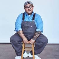picture of Hieu Minh Nguyen sitting on a stool